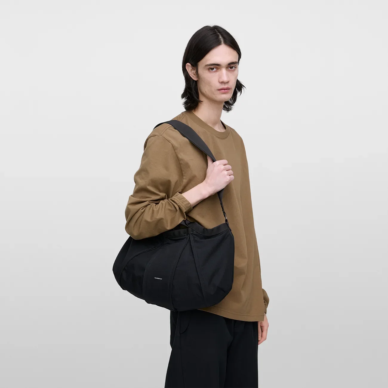 GRID Expandable Crossbody Bag