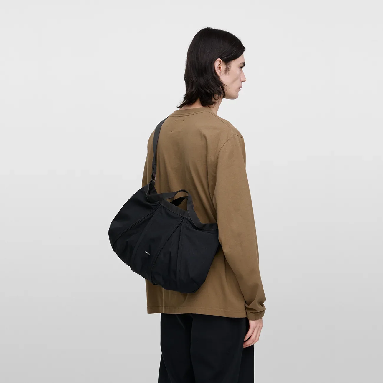 GRID Expandable Crossbody Bag